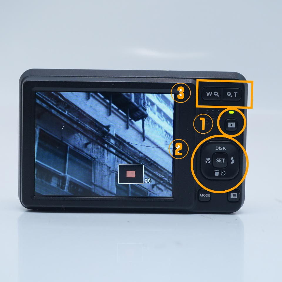 Press the playback button → press the zoom button → use the cursor button to move to the area you want to magnify